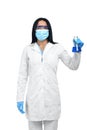 Woman with black hair in white lab coat looking at camera.