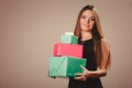 Woman in black with presents Royalty Free Stock Photo