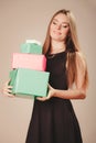 Woman in black with presents Royalty Free Stock Photo