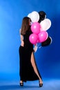 Woman with black, white and pink balloons Royalty Free Stock Photo