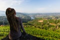 Woman with blond dreadlocks on the viewing point of Douro Valley, Portugal. Royalty Free Stock Photo