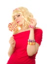 Woman in blond wig with lollipop Royalty Free Stock Photo