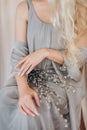 Woman blonde gray dress flowers hair Royalty Free Stock Photo