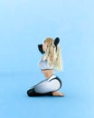 Woman blonde long hair doing yoga