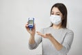 Woman with blood glucose meter, close-up