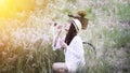 Woman blowing bubbles in meadow. Royalty Free Stock Photo