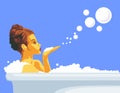 Woman blowing a bubbles off her hand, relaxing in bath with foam Royalty Free Stock Photo