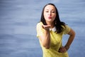 Woman blowing kisses Royalty Free Stock Photo