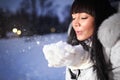 Woman Blowing Snow