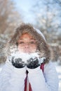 Woman blowing snow Royalty Free Stock Photo