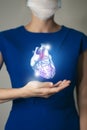 Unrecognizable woman in blue clothes holding highlighted handrawn Heart in hands. Medical illustration, template, science mockup