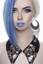 Woman with blue hair and jewelry