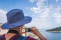 Woman in blue hat on the walls of Dubrovnik Royalty Free Stock Photo