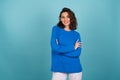 Woman In A Blue Knitted Sweater And Natural Make-up, Curly Short Hair