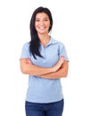 Woman in blue polo shirt with arms crossed