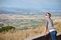 Woman with blue sunglasses looking Curious at the sky in Santuari de Cura, Mallorca, Spain Royalty Free Stock Photo