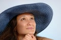 Woman in a Blue Sunhat