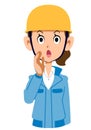 Woman in blue work wear wearing a calling helmet