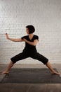 Woman Boabom forward pose hand kick martial arts Tibet