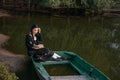 woman in the boat is reading a book Royalty Free Stock Photo