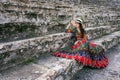 Woman in bohemian dress sitting on theater of Hierapolis ancient city in Pamukkale, Turkey. Royalty Free Stock Photo