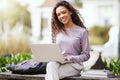 Woman, books and laptop with university student on campus, learning with scholarship at college and outdoor. Female Royalty Free Stock Photo