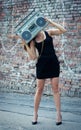 Woman with boom box face Royalty Free Stock Photo