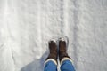 Woman boot making print in snow Royalty Free Stock Photo