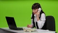 Woman boss scolds the subordinates by telephone. Studio