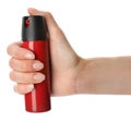 Woman with bottle of gas pepper spray on white background Royalty Free Stock Photo