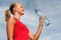 Woman with bottle of mineral water Royalty Free Stock Photo