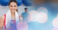 Woman with bottle and towel and blue pink bokeh transition Royalty Free Stock Photo