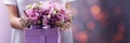 Woman with bouquet of beautiful roses in gift box on blurred background, closeup. Happy Mother's Day or Happy Royalty Free Stock Photo