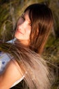 Woman with bouquet of feather-grass