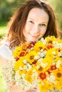 Woman with bouquet of flowers Royalty Free Stock Photo