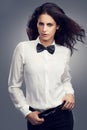 Woman, bow tie or portrait of fashion model with vintage clothes or classy aesthetic in studio. Confidence, edgy lady or Royalty Free Stock Photo