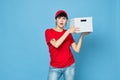 woman with box in hands delivery courier blue background