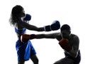 Woman boxer boxing man kickboxing isolated Royalty Free Stock Photo