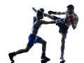 Woman boxer boxing man kickboxing silhouette isolated Royalty Free Stock Photo