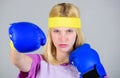 Woman boxing gloves enjoy workout. Girl learn how defend herself. Woman exercising with boxing gloves. Boxing sport Royalty Free Stock Photo