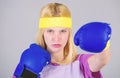 Woman boxing gloves enjoy workout. Girl learn how defend herself. Woman exercising with boxing gloves. Boxing sport Royalty Free Stock Photo