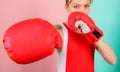 Woman boxing gloves focused on attack. Ambitious girl fight boxing gloves. Female rights. I am gonna kick you off Royalty Free Stock Photo
