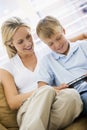 Woman and boy in living room Royalty Free Stock Photo