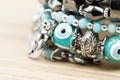 Woman bracelet on wooden background