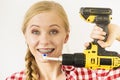 Woman with braces brushing teeth with drill Royalty Free Stock Photo