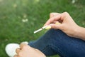 Woman breaking cigarette in outdoor Royalty Free Stock Photo