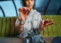 Woman brewing a fresh mug of tea with teabag in cafe Royalty Free Stock Photo