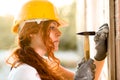 Woman Bricklayer with Hammer Royalty Free Stock Photo