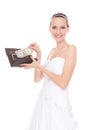 Woman bride with one dollar. Wedding expenses. Royalty Free Stock Photo