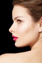 Woman with bright fuchsia lips make-up, clean skin